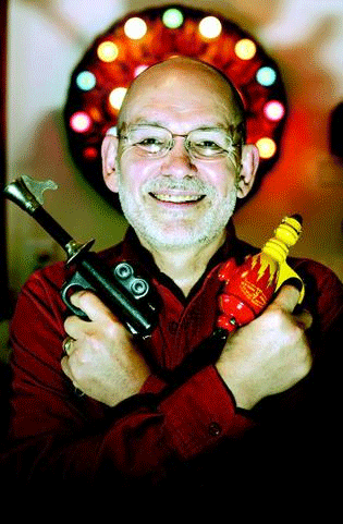 Gary Wolf with vintage toy ray guns - photo by Matthew Healey